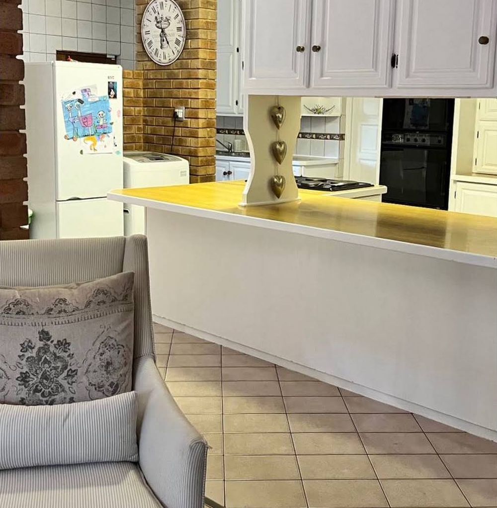 Kitchen with freshly painted white cupboards